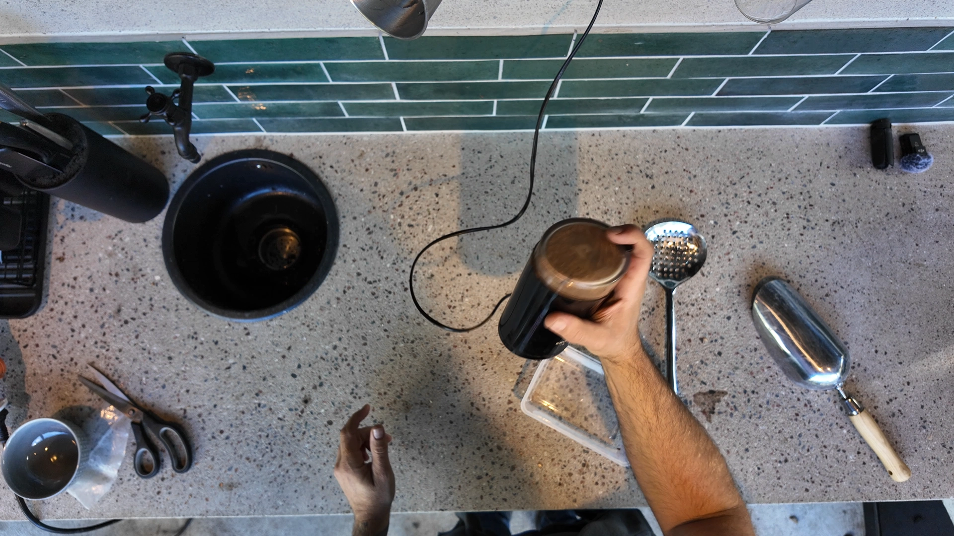 Grinding Caramünich Type 1 in a handheld grinder.